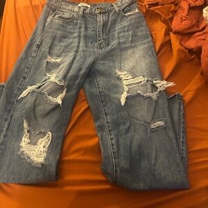 Vibrant High Rise Distressed Blue Jeans